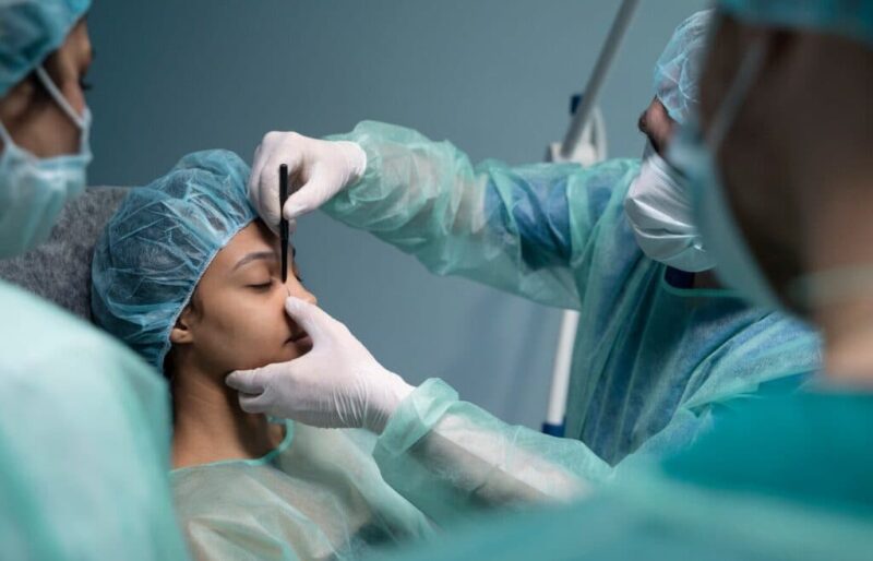 side-view-doctor-checking-patient-before-rhinoplasty_23-2149352178-1024×683